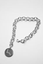 Load image into Gallery viewer, Sterling Silver Charm Bracelet made using traditional handheld Jewellery techniques with Branded Coin detail and two bespoke charms
