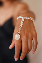 Load image into Gallery viewer, Sterling Silver Charm Bracelet made using traditional handheld Jewellery techniques with Branded Coin detail and two bespoke charms